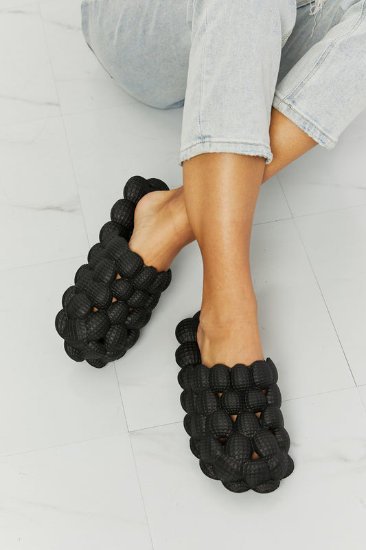 NOOK JOI Laid Back Bubble Puffy Cloud Slide On Flat Comfy Sandals in Black